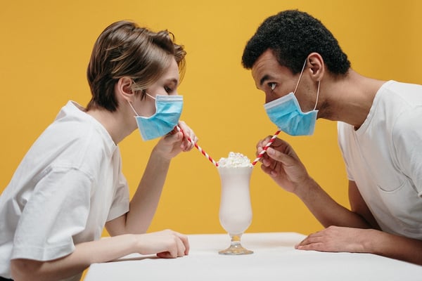 couple-wearing-face-mask-drinking-milkshake-3951901